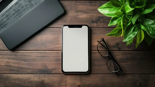 Blank phone quietly steals spotlight on tidy wood desk