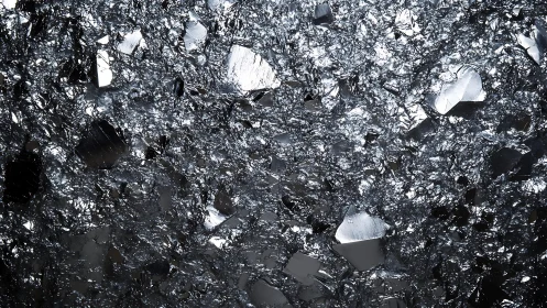 Reflective metallic crystals in a close-up abstract texture photograph.