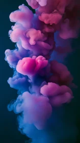 Colorful ink clouds swirl in dreamy abstract motion.