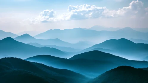 Gentle blue mountains fading into a dreamy, peaceful horizon.