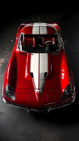 Crimson classic muscle car crowned with racing ivory stripes.