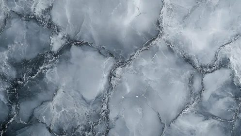 Abstract close-up of blue marble texture with natural veining.