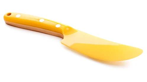 Modern yellow cheese knife with wooden handle, minimalist style.