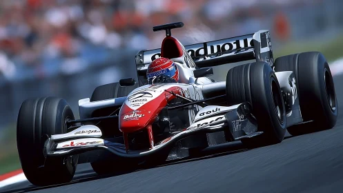 Red-tipped thunderbolt F1 car carving heat into tarmac.