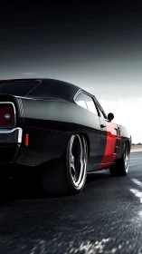 Midnight muscle charger storms the open highway horizon.