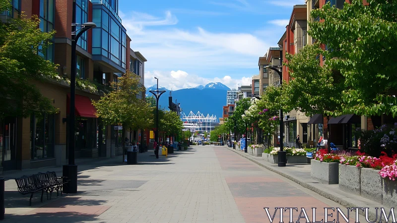 Pedestrian urban corridor aligned to vanishing point with mountain backdrop