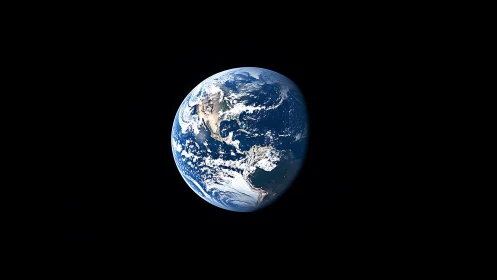 Earth rises in deep black space, blue oceans dominant.