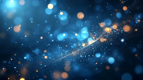 Abstract blue and gold bokeh lights with cosmic swirl effect.