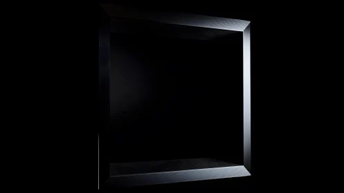 Minimalist black metallic square frame with dramatic lighting.