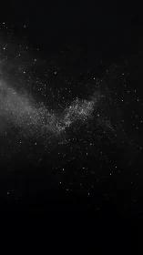 Stellar particulate dispersion across deep black field.
