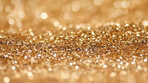 Golden glitter waves sparkling in soft dreamy light.