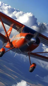 Bright red airplane soars confidently through crisp blue sky