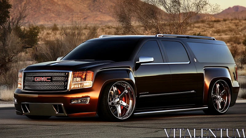 Custom GMC SUV slammed stance in sunlit desert setting.