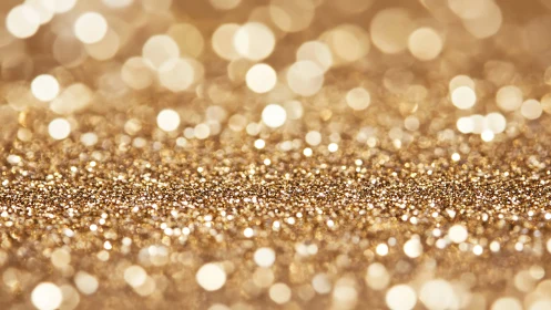 Glistening golden sparkle field with softly glowing lights.