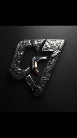 Metallic angular logo emblem with textured chrome surface.