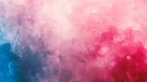 Dreamy pink and blue clouds swirling in gentle motion.