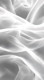 Soft white translucent fabric waves in layered folds.