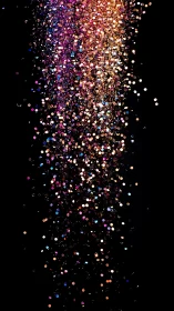 Vertical cascade of multicolor glitter on black background.