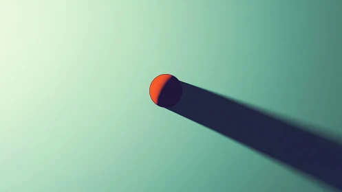 Red sphere casts elongated shadow on teal ground plane