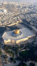 Golden dome quietly crowns stone terraces above the city
