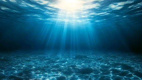 Subsurface ocean view with downward sunlight beams.