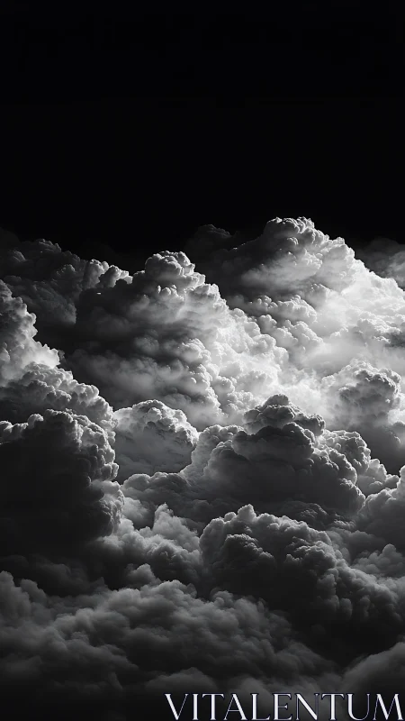 Monochrome cumulonimbus field rendered in dramatic chiaroscuro