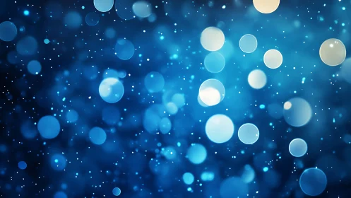 Luminous blue bokeh orbs floating on deep abstract field.
