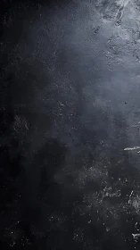 Dark textured wall surface shows gritty abstract depth.