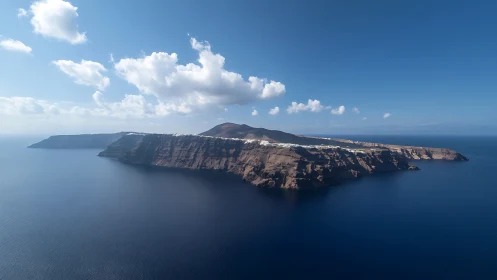 Volcanic Island Rising from Azure Sea.