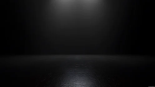 Empty dark studio stage under twin overhead spotlights
