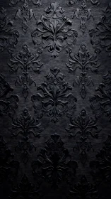 Low-key baroque damask relief with glossy black embossing.