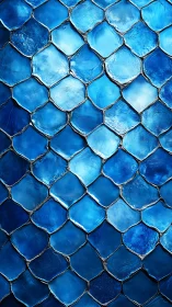 Glistening blue glass scales shimmer with ocean calm.