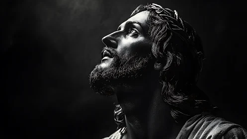 Dramatic monochrome portrait of a sorrowful crowned figure in prayer