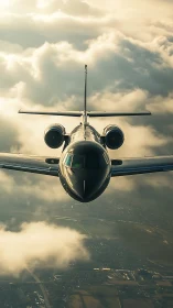 Business jet frontal view captures aerodynamic symmetry in clouds