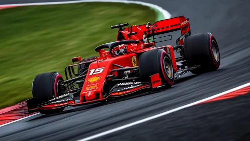 Red Formula racing car taking a fast corner on track.
