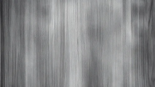 Gray vertical brushed metal panel with linear grain texture