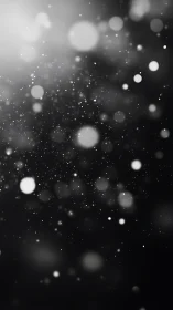 Gentle floating lights drifting through a dreamy night sky.