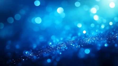 Sparkling Blue Bokeh Abstract Background with Glitter Effect.