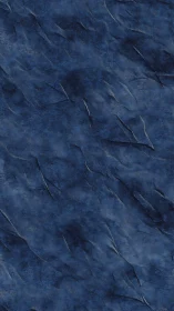 Deep blue textured background with soft flowing creases.