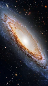 Spiral galaxy glows in deep space amid scattered star fields