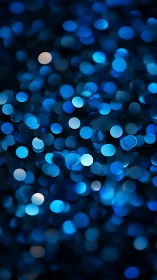 Defocused blue bokeh orbs form layered nocturnal light field
