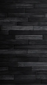 Cozy charcoal wood wall with softly textured dark planks.