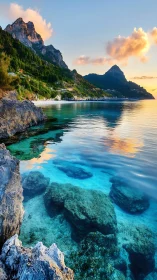 Coastal cliffs, clear shallows, and distant forested peaks.