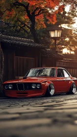Stanced red BMW 2002 on cobblestone street at autumn dusk