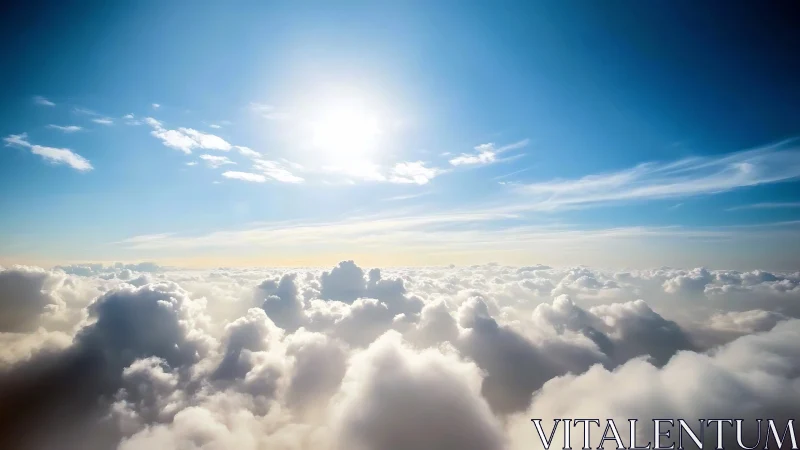 Sunlit cumulus cloudscape with expansive blue atmosphere.