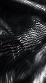 Monochrome textile waves reveal metallic abstract texture