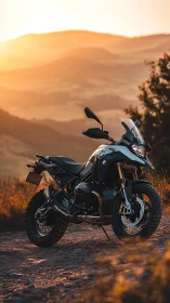 Sunlit adventure motorcycle resting on a mountain trail.