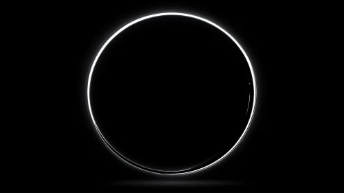 Minimal glowing ring on black background, centered circle.