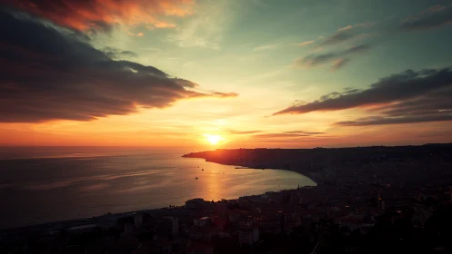 Gentle coastal sunset pouring golden light over a quiet bay.