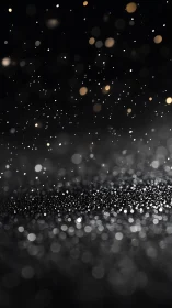 Defocused glitter particles scatter across dark background